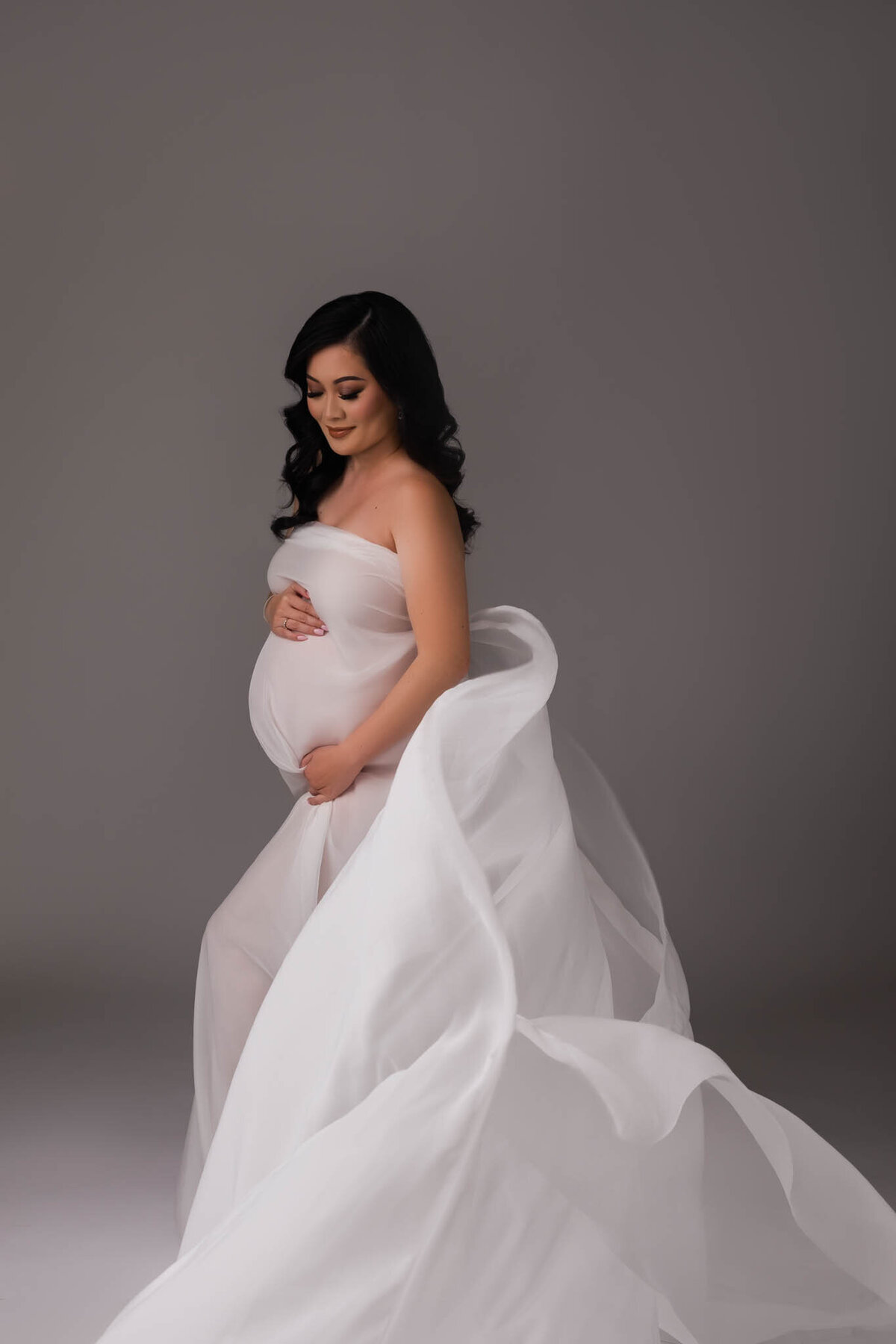 white fabric maternity photos