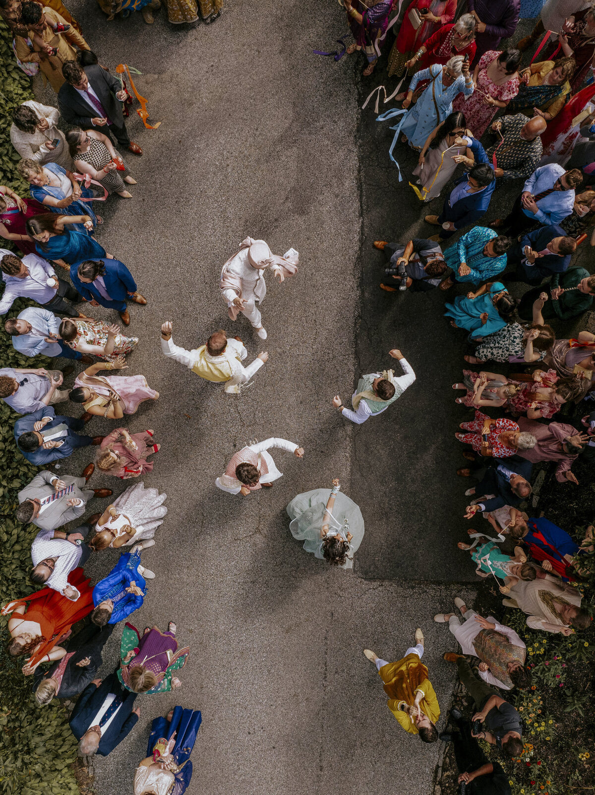 aerial-view-dancing-baraat-parade-indian-wedding