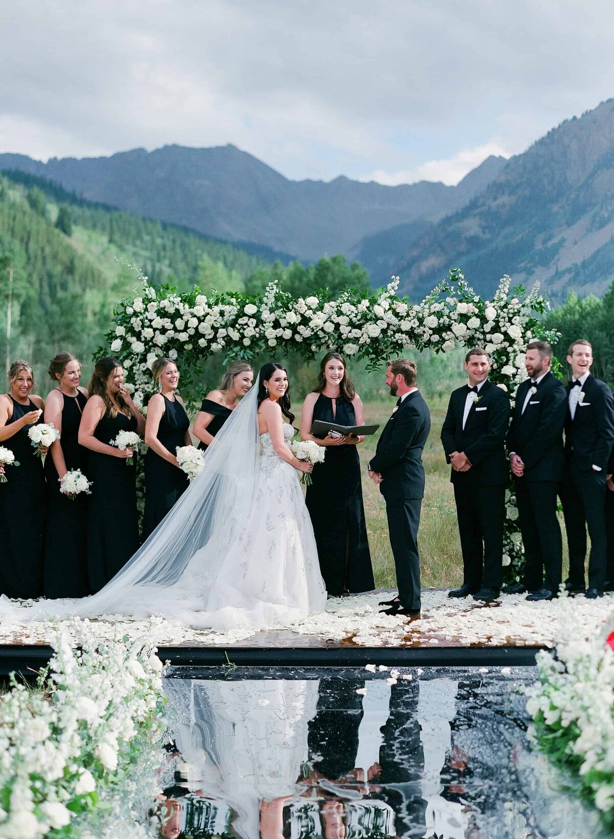 Outdoor wedding ceremony with a mountain backdrop
