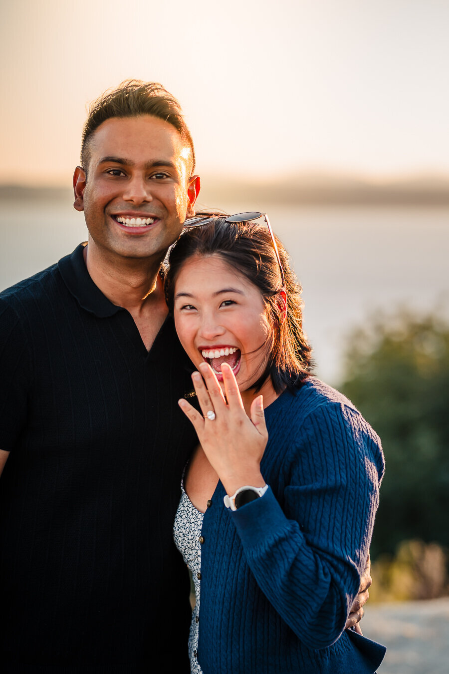 fiance-showing-off-ring-just-engaged-surprise-proposal-photoshoot