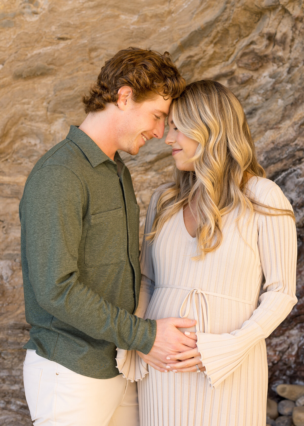 candid maternity photos on the beach