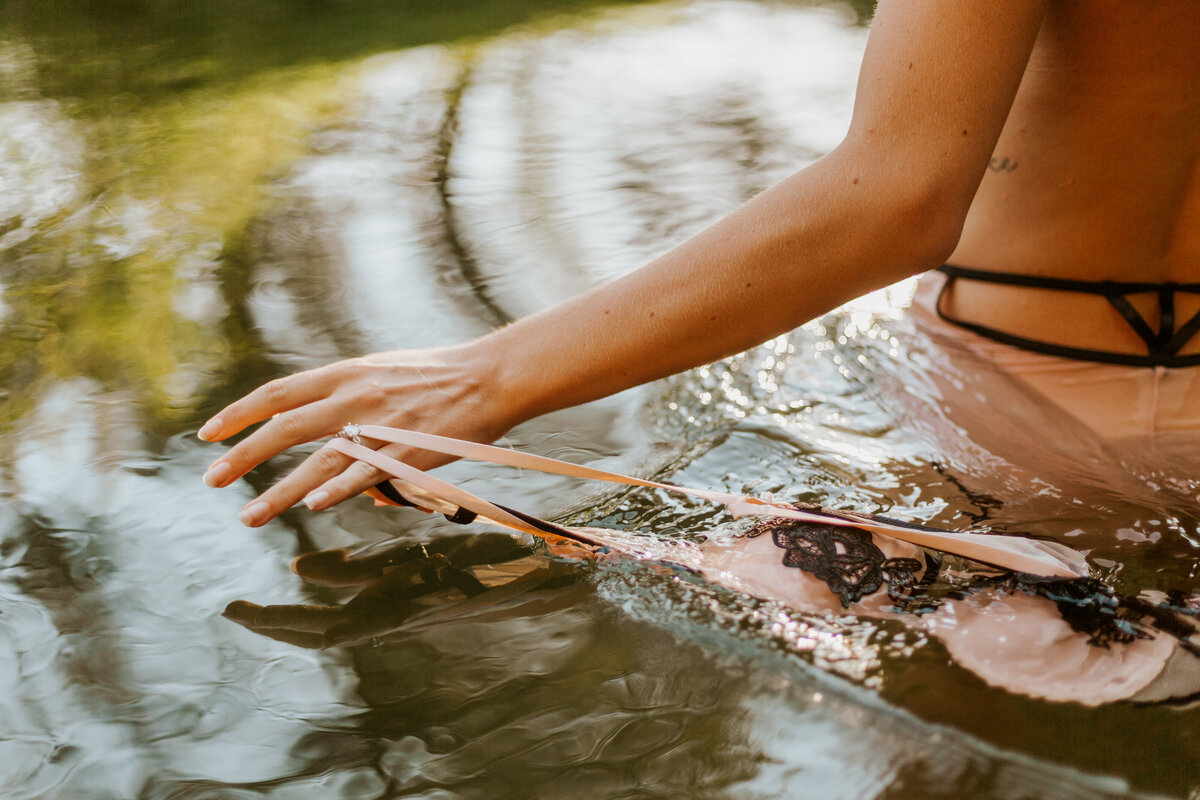 woman posing in river