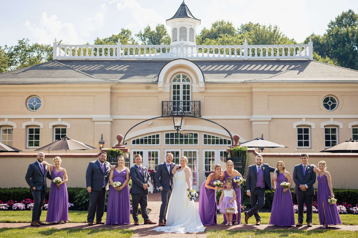 Black Groomsmen Suit & Purple Bridesmaid Dresses