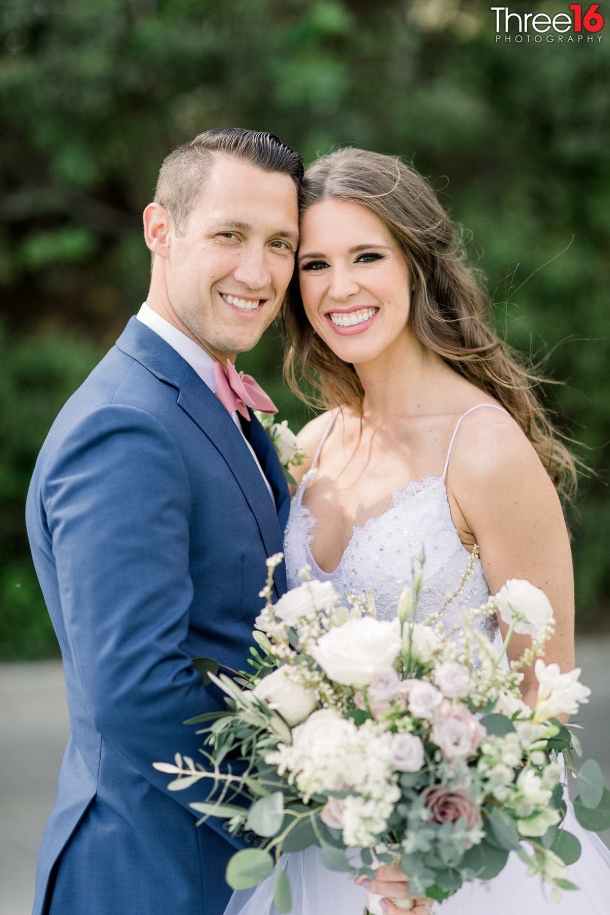 Bride and Groom are all smiles during their photo shoot