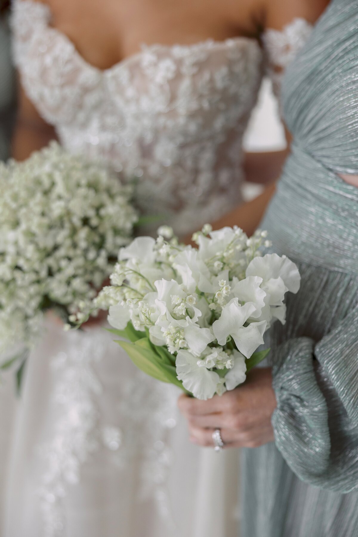 Close up for cream petite bouquets for Newport wedding.