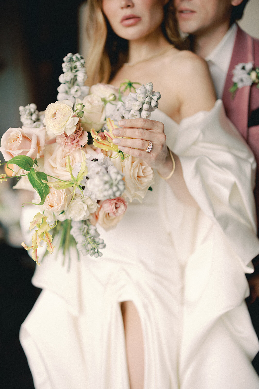 Close-up of a bride's pastel colored bouquet