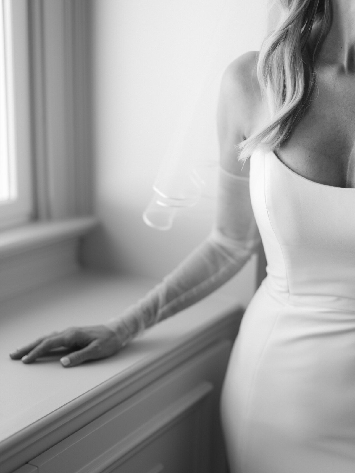 Modern wedding gown with custom beaded sleeves