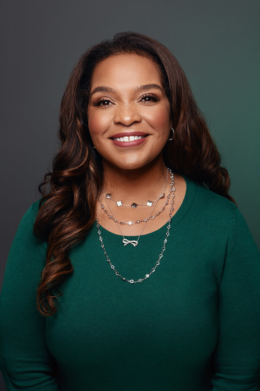 Polished corporate portrait of Dana S., showcasing professionalism and warmth, shot by Ylva Erevall.