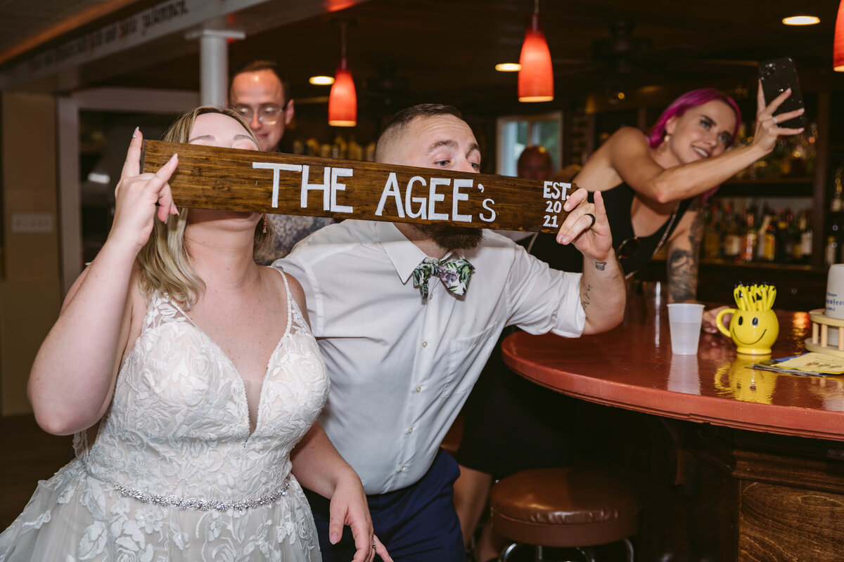 bride and groom on wedding day drinking