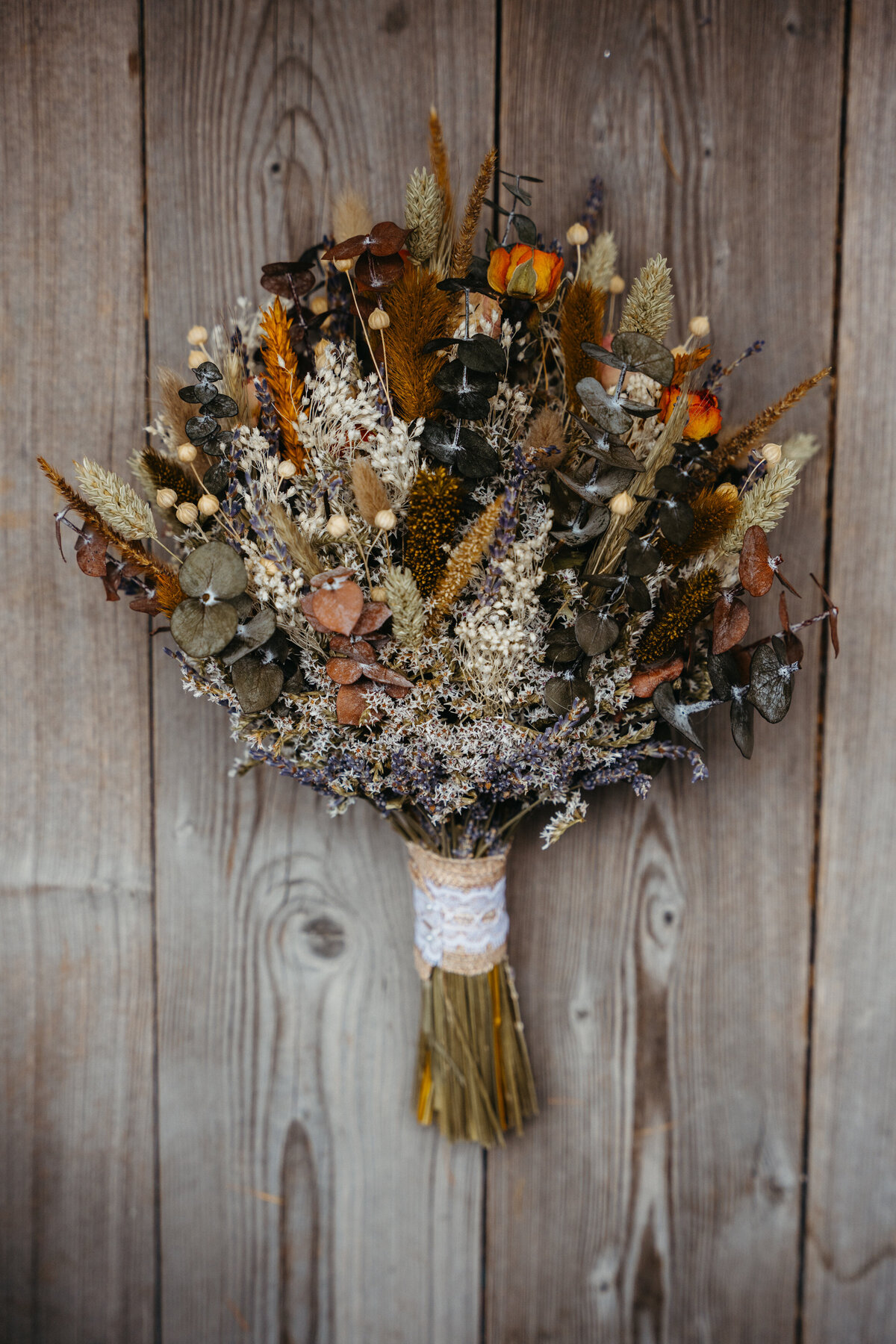 Flatlay with stationery, ribbons, and sentimental Dolomites elopement details