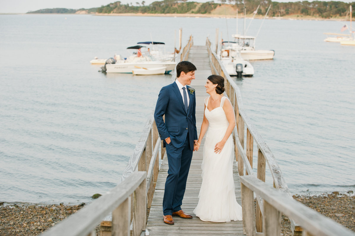 Bride and groom on dock