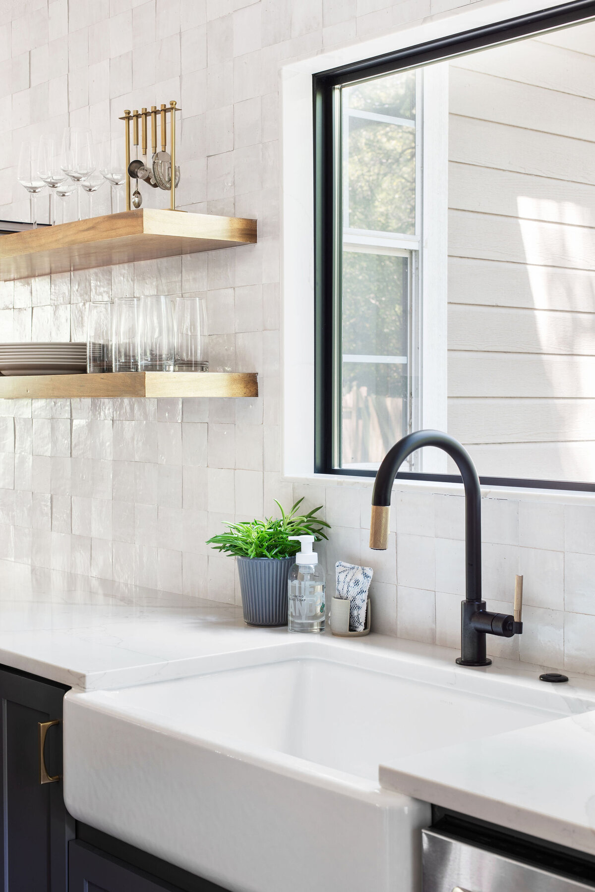 hello-home-two-tone-cabinets-kitchen-remodel-hardwood-flooring-quartz-window-jamb-zellige-backsplash-austin-15