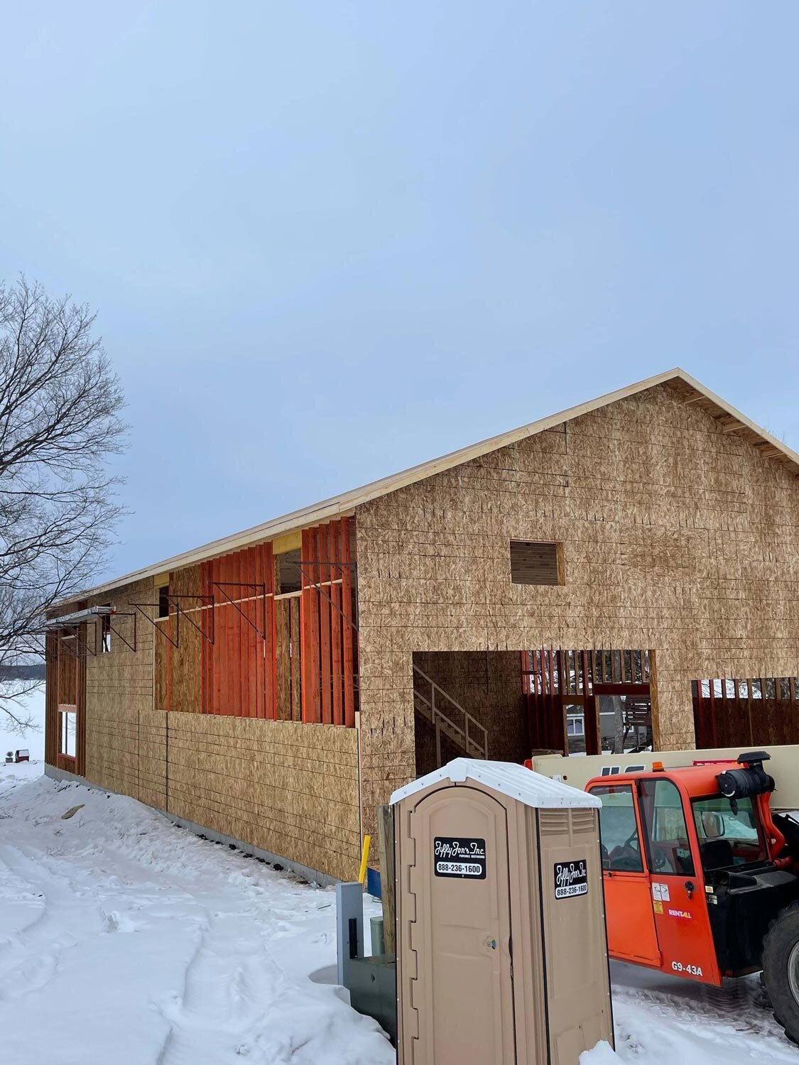 Garage view of framed home construction