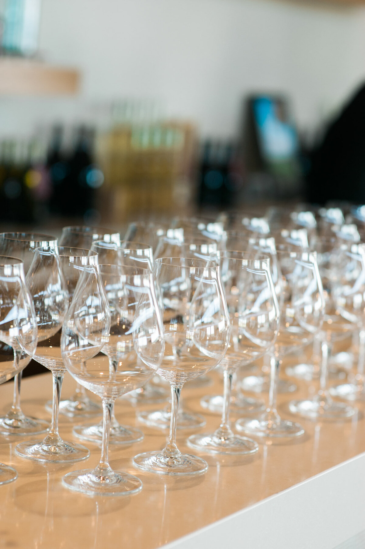 empty wine glasses at ponzi winery wedding