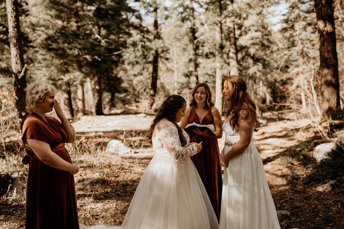 lesbian couple saying vows in Taos New Mexico