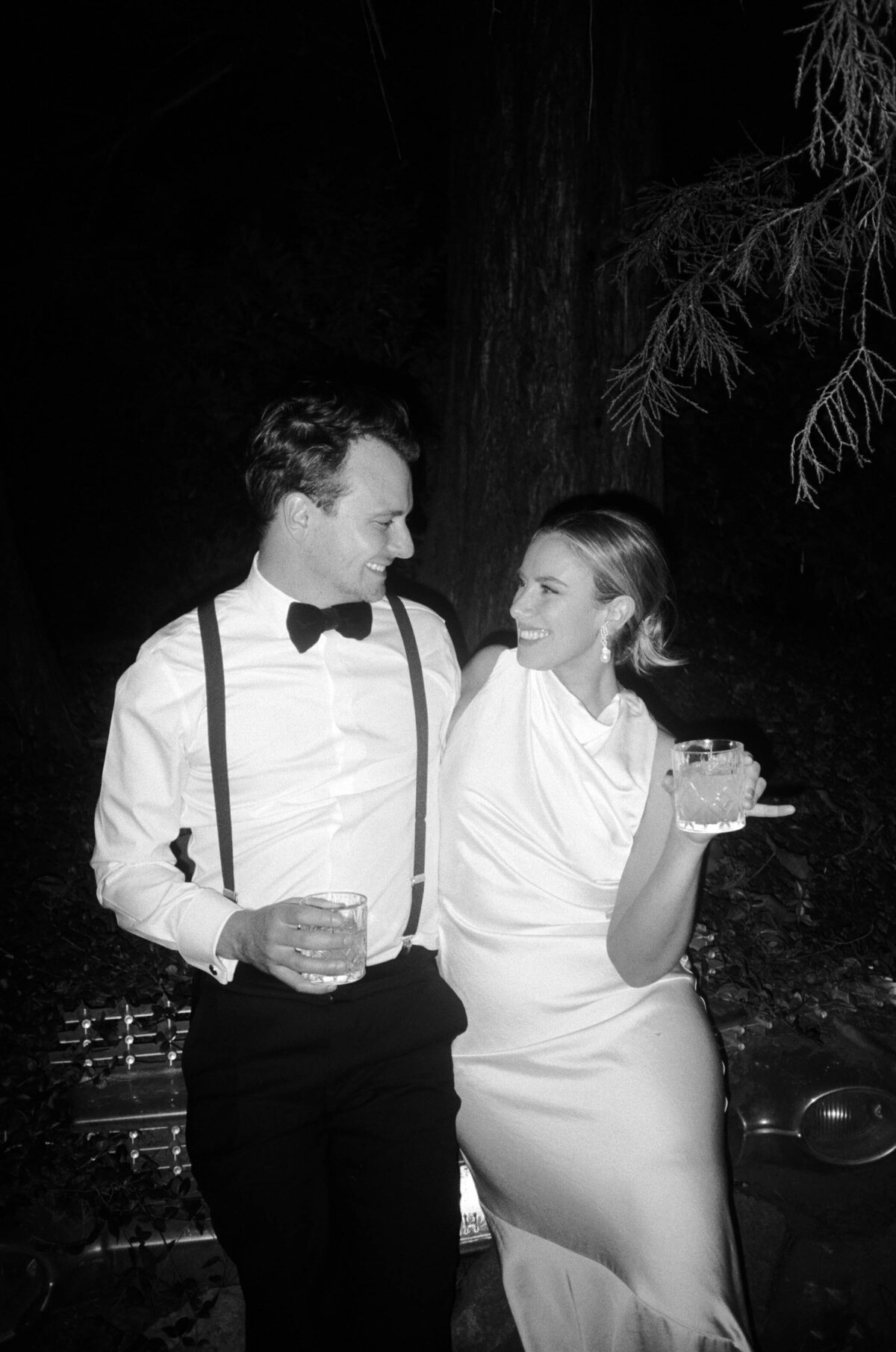 Bride and Groom on black & white film with cocktails at The Griffin House.