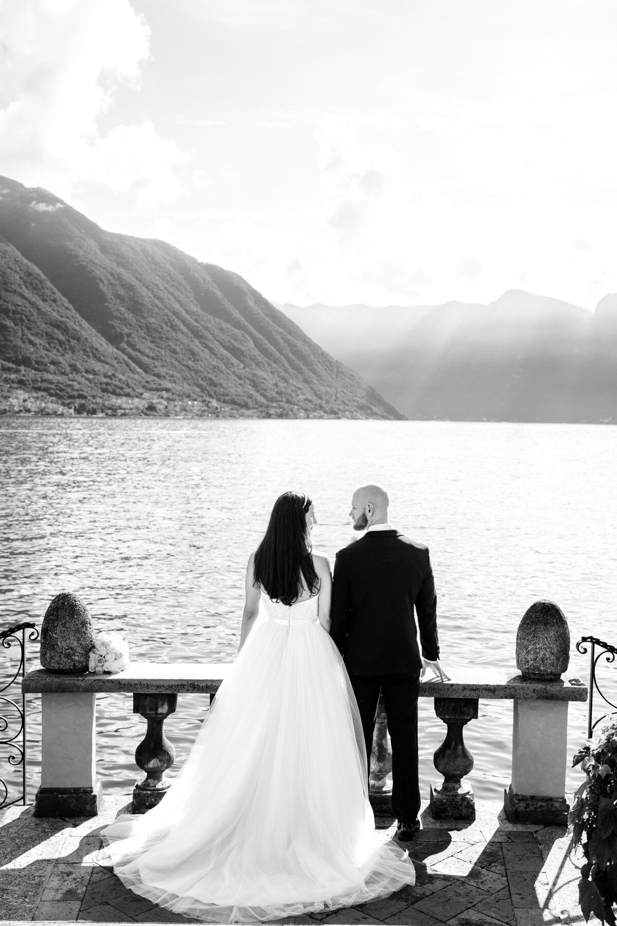 Black and white film photograph of an elopement at Villa Cassinella on Lake Como Italy