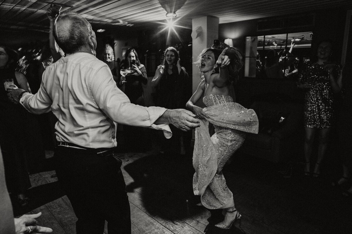Daughter and dad dance together at wedding 