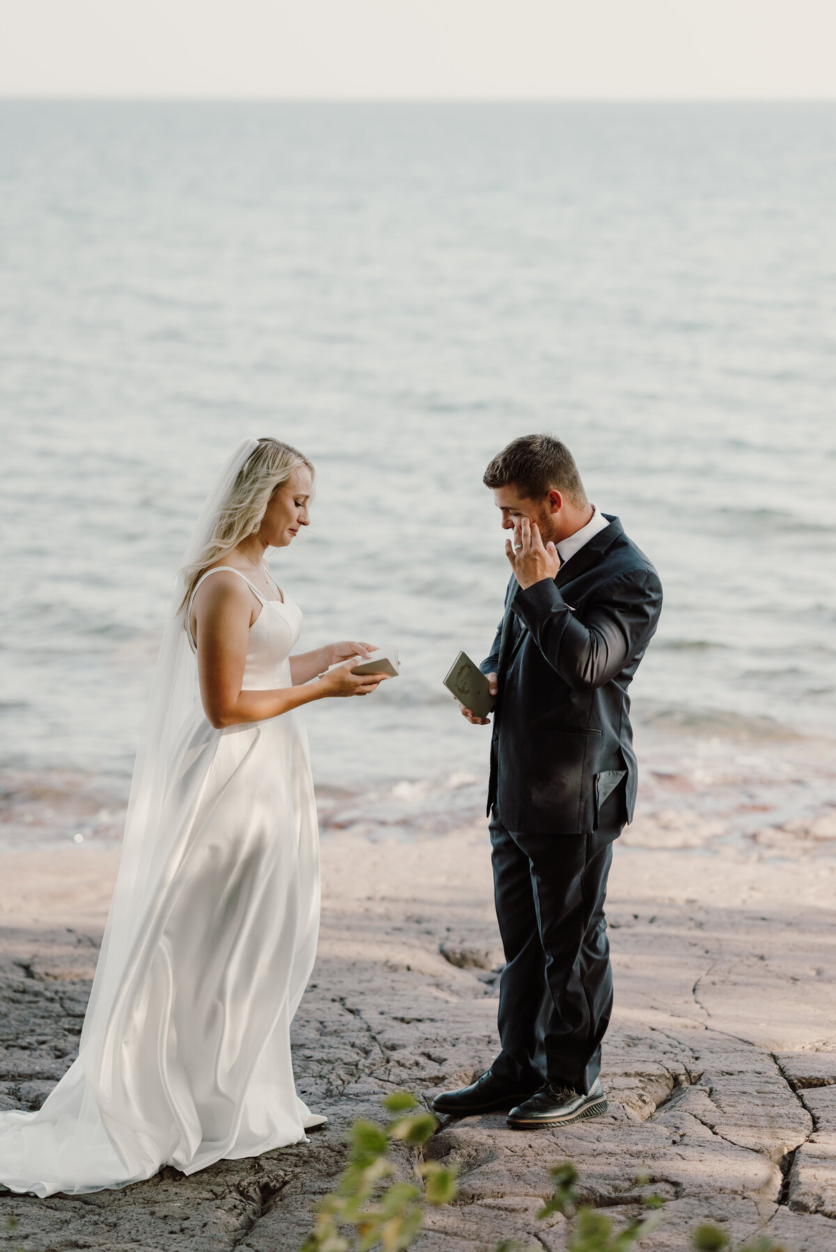couple exchange their vows on the coast