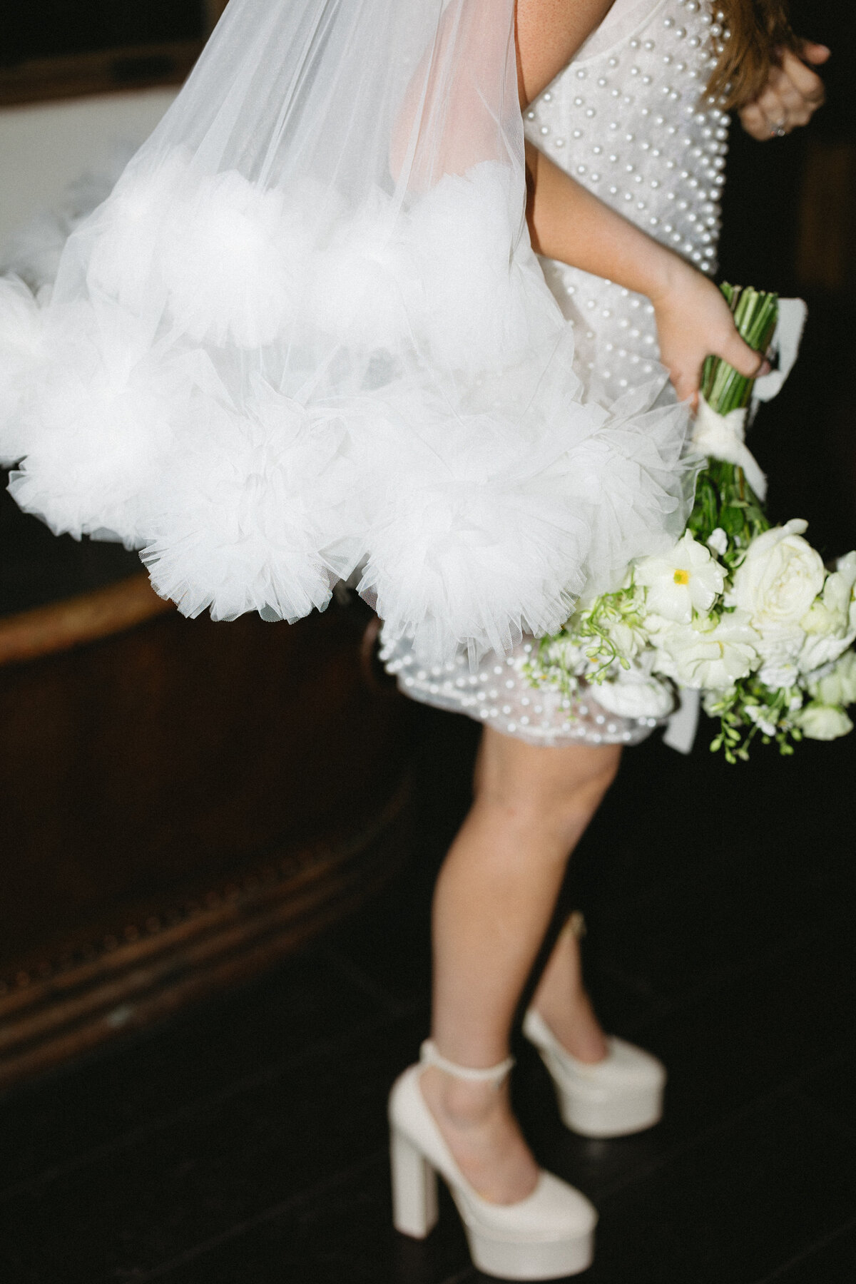 Fun reception moment as the bride changes into her second dress.