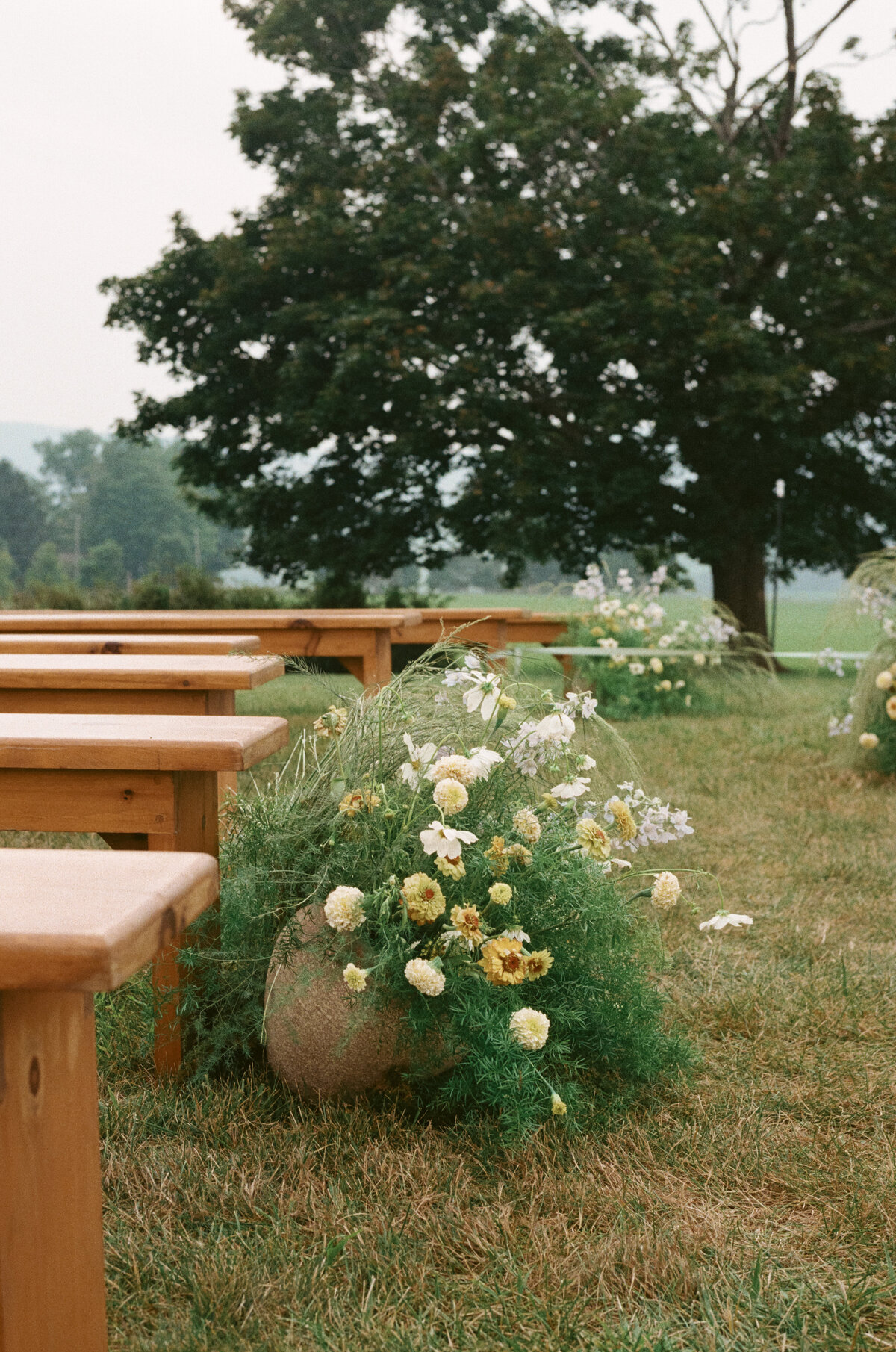 Elegant editorial wedding photography capturing sophisticated aesthetics at Connecticut luxury destination venue. Lauren Alatriste's fashion photography expertise creates wedding imagery that transcends traditional documentation, balancing artistry with authentic love.