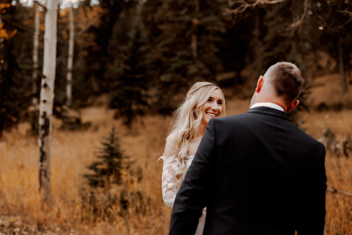 Groom seeing his bride for the first time in Pine, Colorado