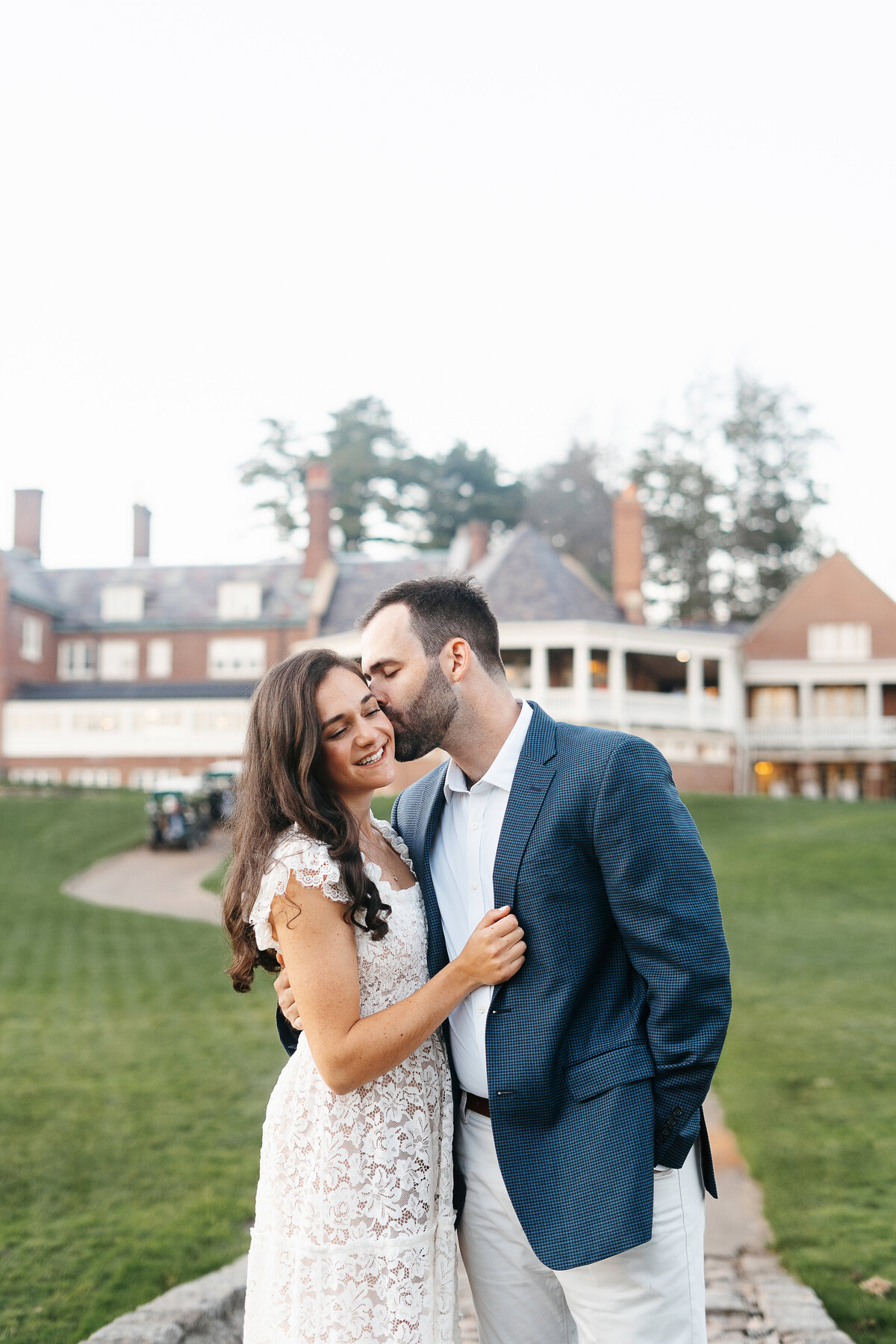Timeless Love: A beautiful moment captured in engagement photos by Danielle Littles Photography, showcasing the genuine connection and joy between the enchanting couple.