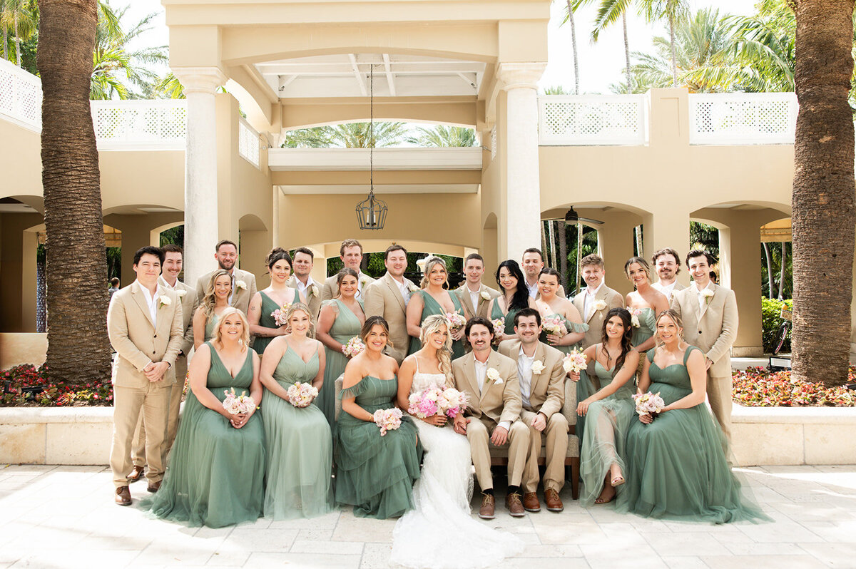 Brenda and her bridesmaids posing in front of the stunning Cheeca Lodge wedding venue.