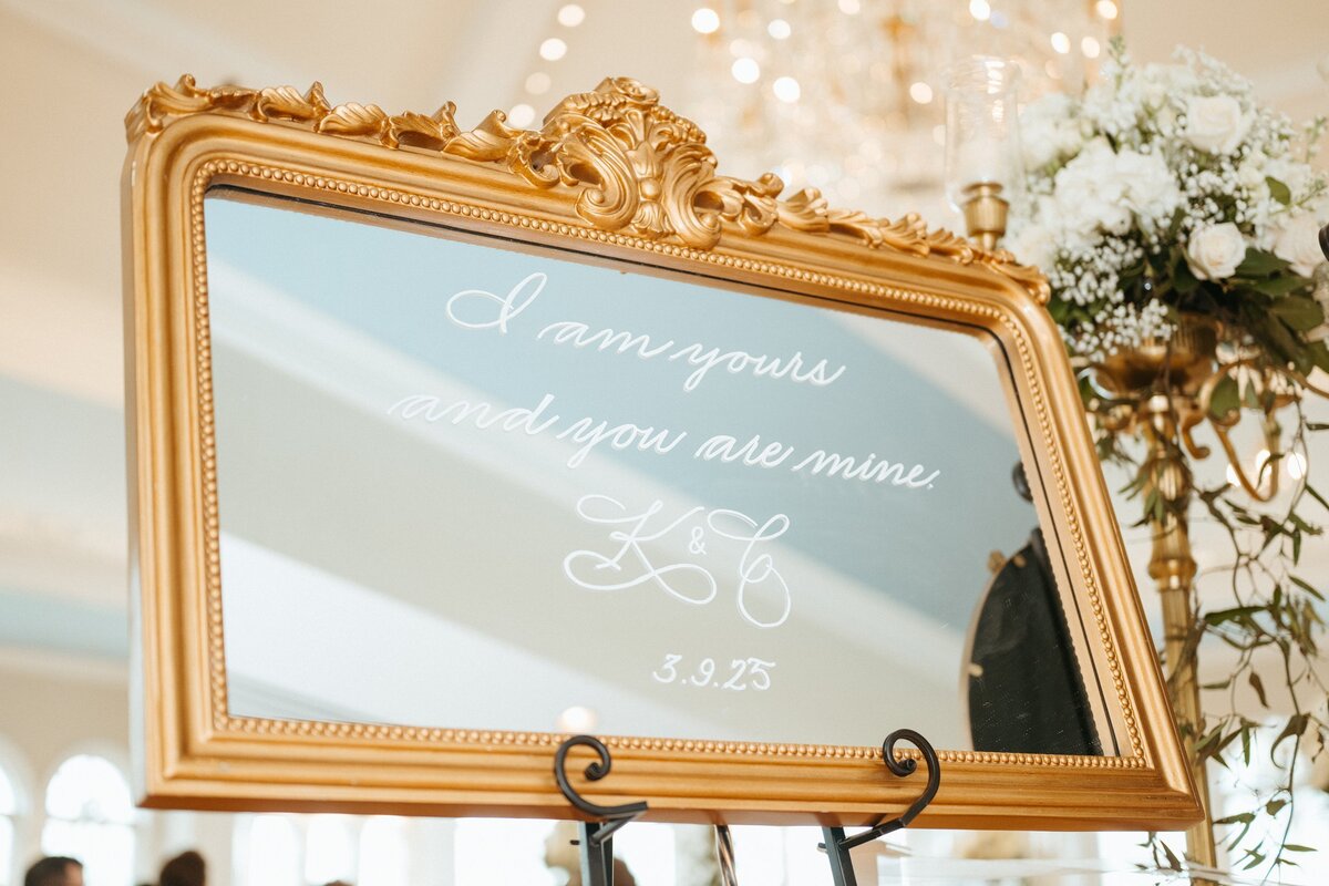 Medium horizontal mirror with ornate ornament on top with calligraphy for welcome sign