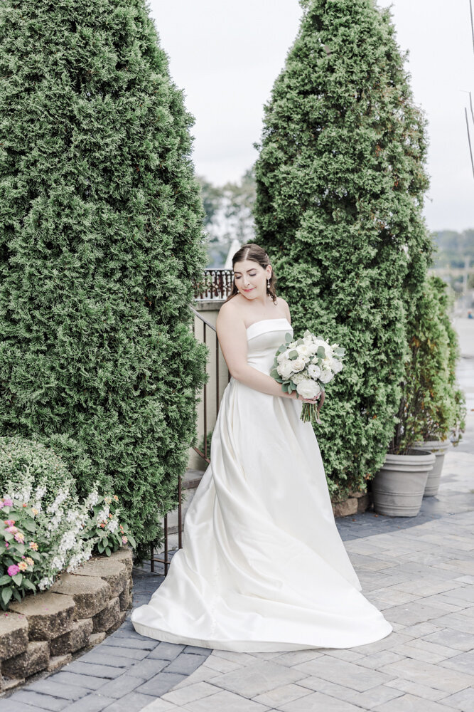 bride in wedding gown holding a bouquet