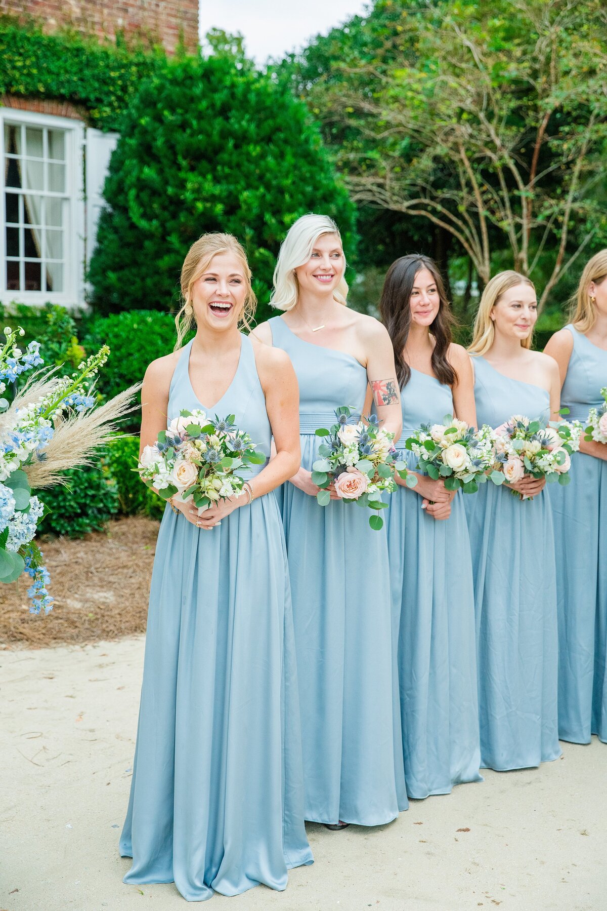 maid of honor cries as her sister walks down the aisle