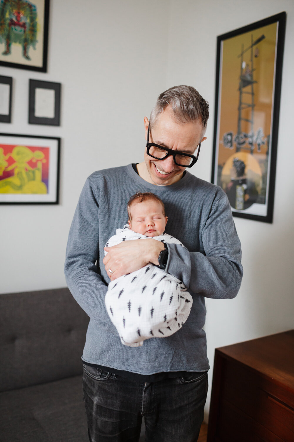 Dad holding his daughter