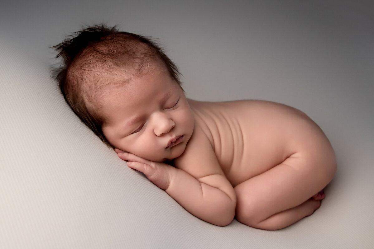 posed in-studio newborn session. Dixon, ca newborn photography. baby boy newborn session