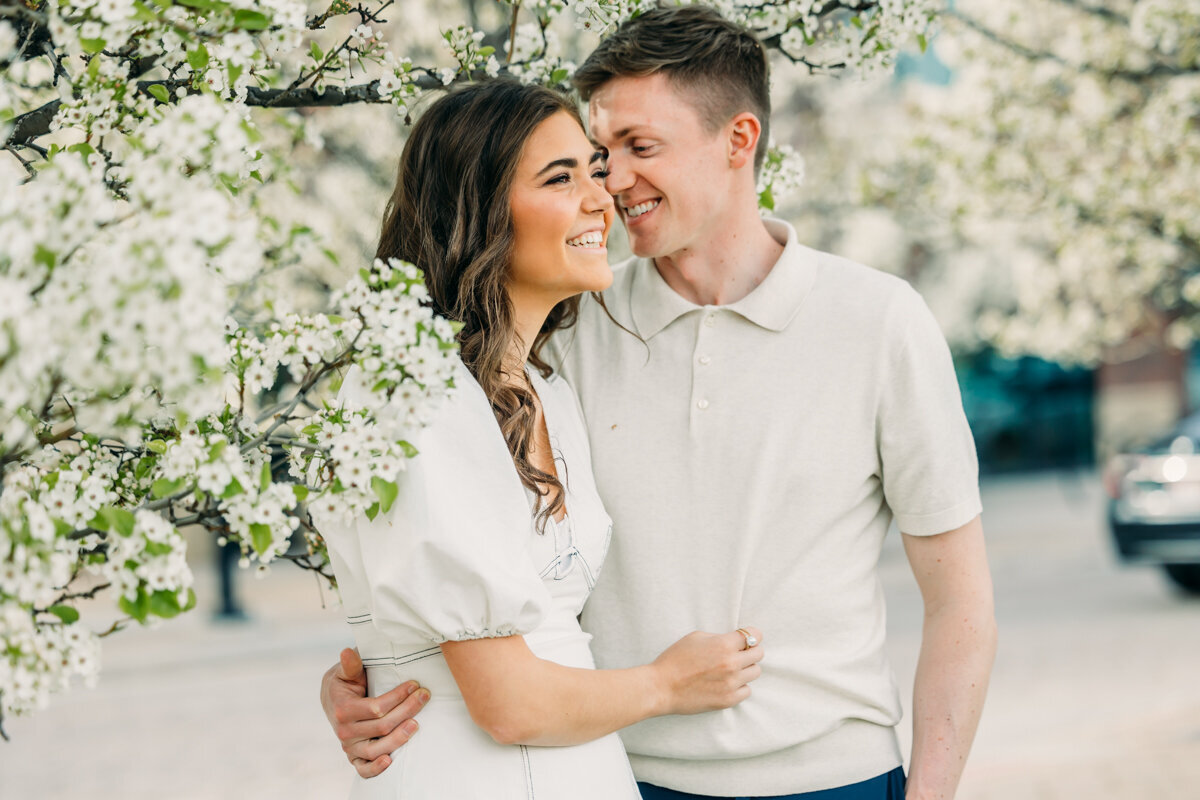 Idaho Falls engagement photo with spring blossoms