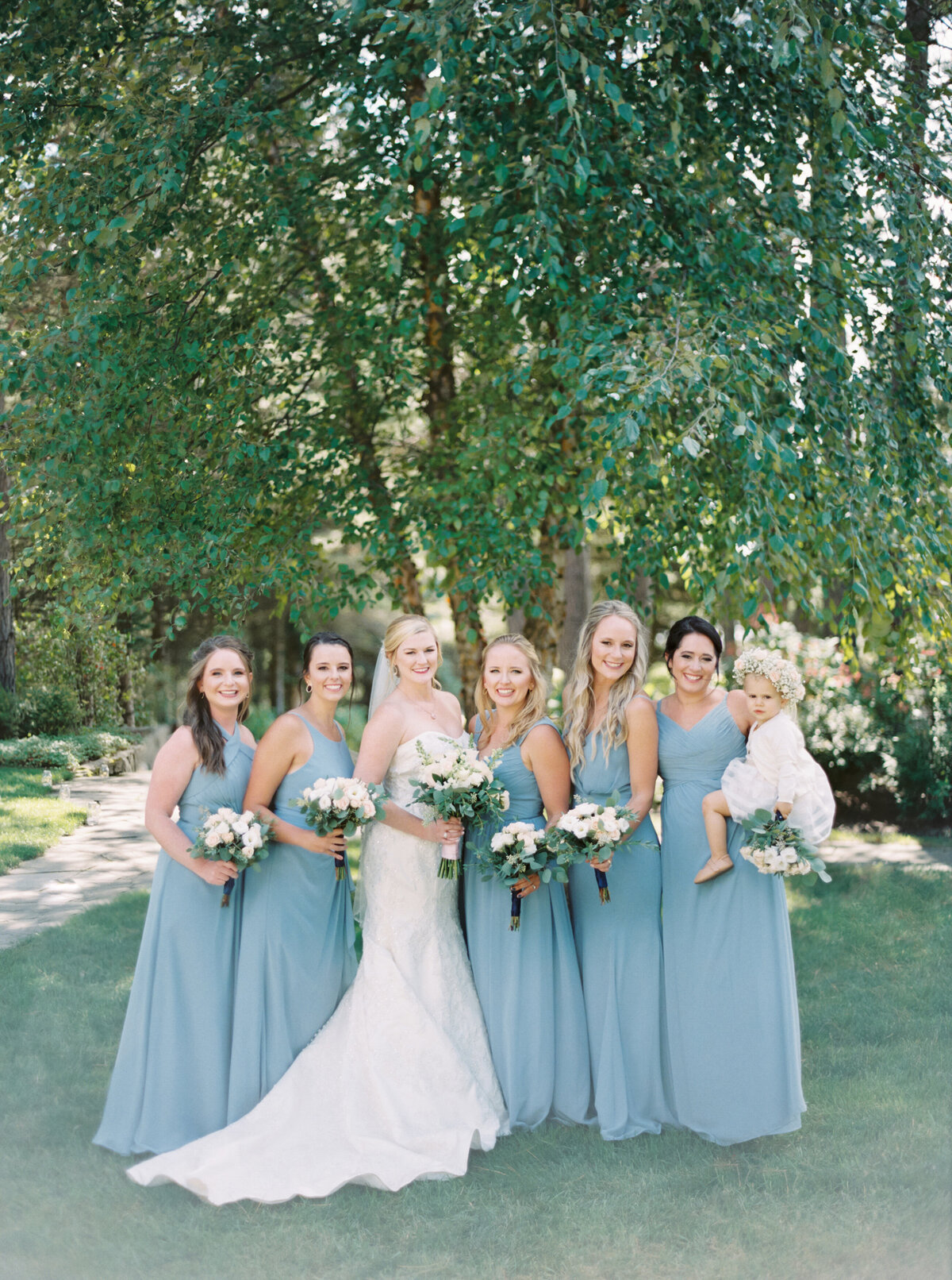 Bride with her bridesmaids photographed by Chicago editorial wedding photographer Arielle Peters