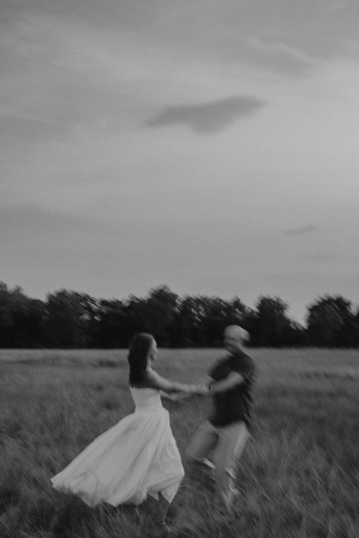 blurry trendy engagement session photos, texas panhandle field