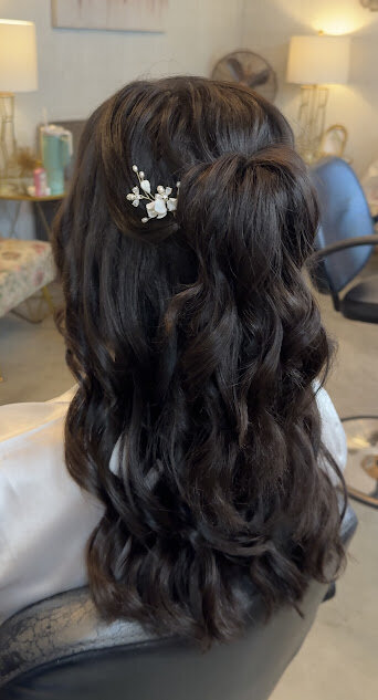 half up bridal hair with floral pins