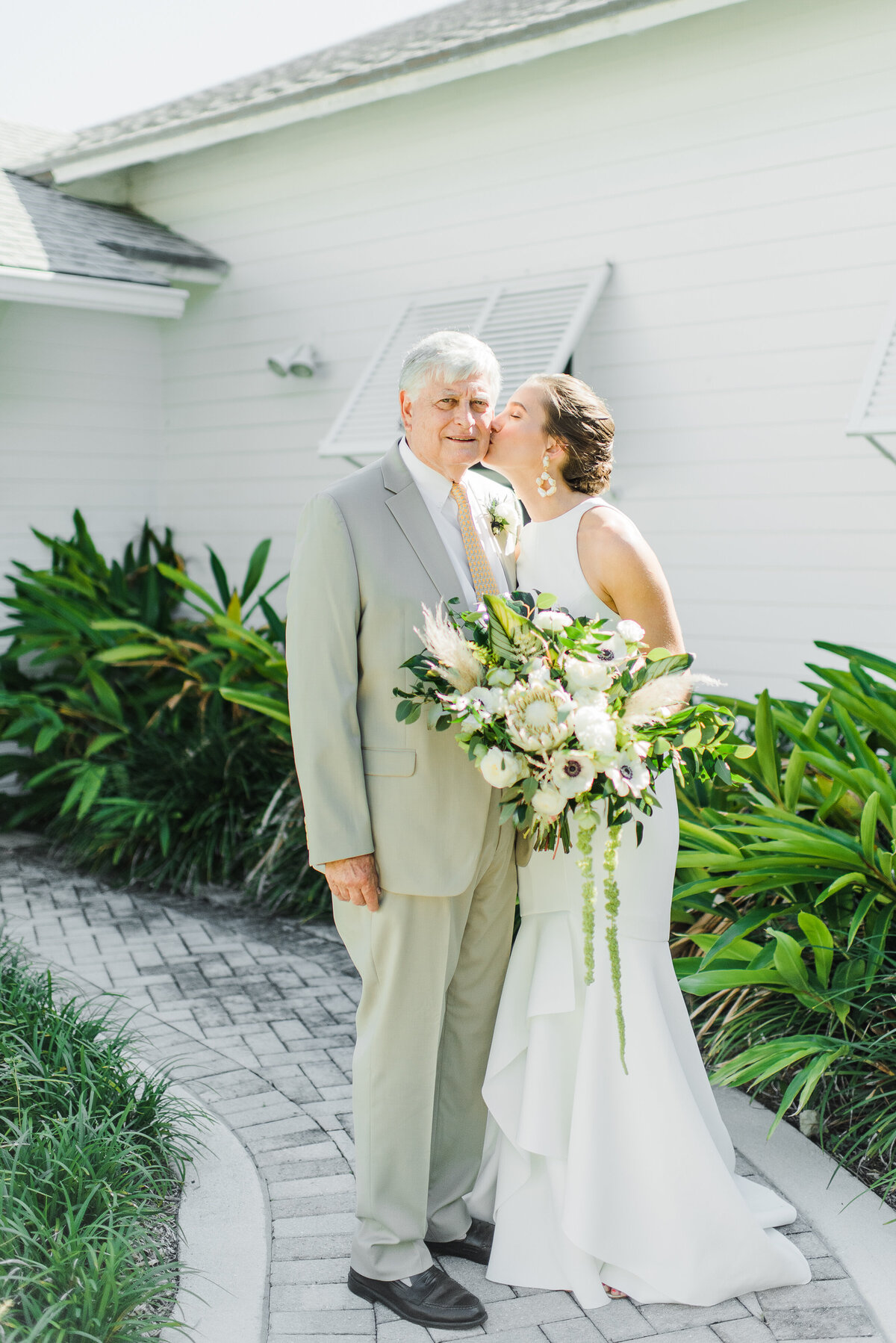 Bride and her grandfather - Bride kissing her grandpa