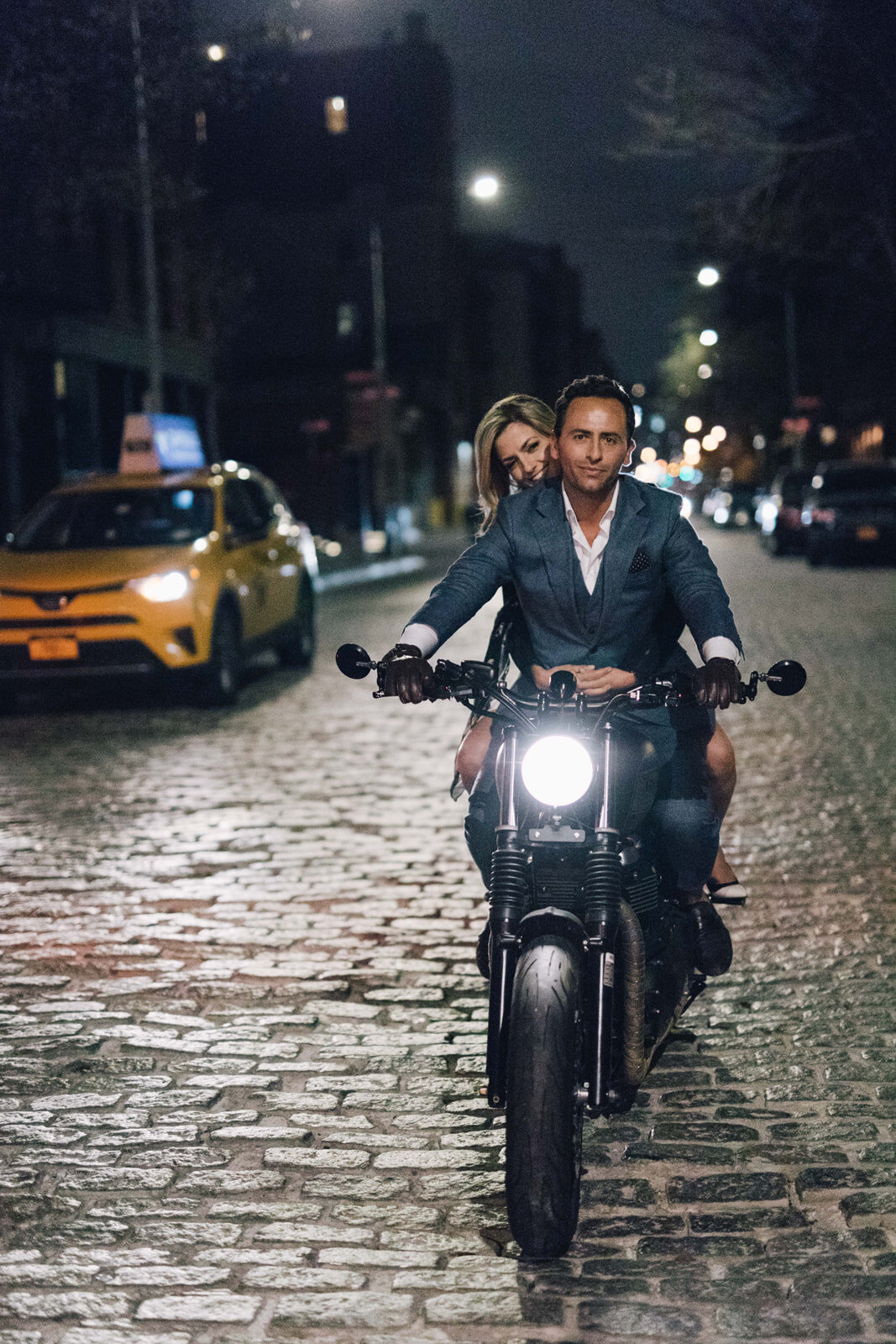 Bride and groom on a motorcycle