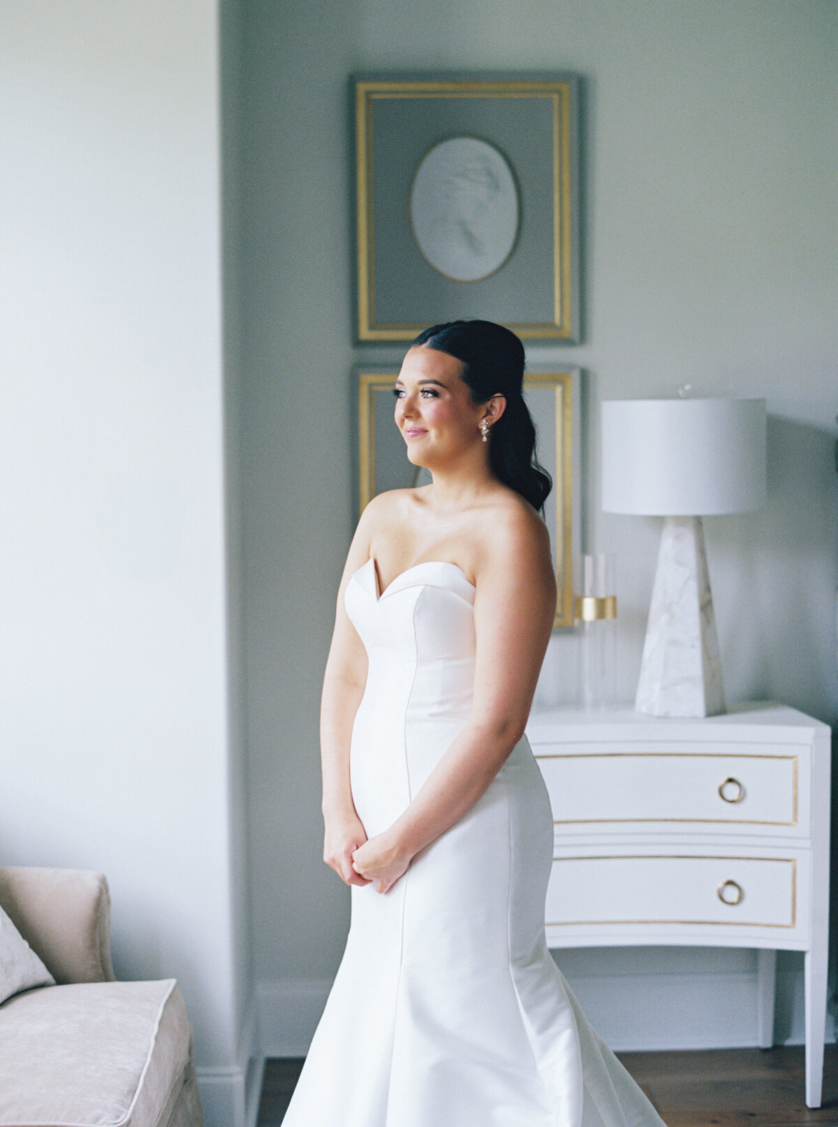 Bride preparing for her wedding day, looking elegant and classic as she gets ready, captured by Morgan Alysse, Lafayette wedding photographer.