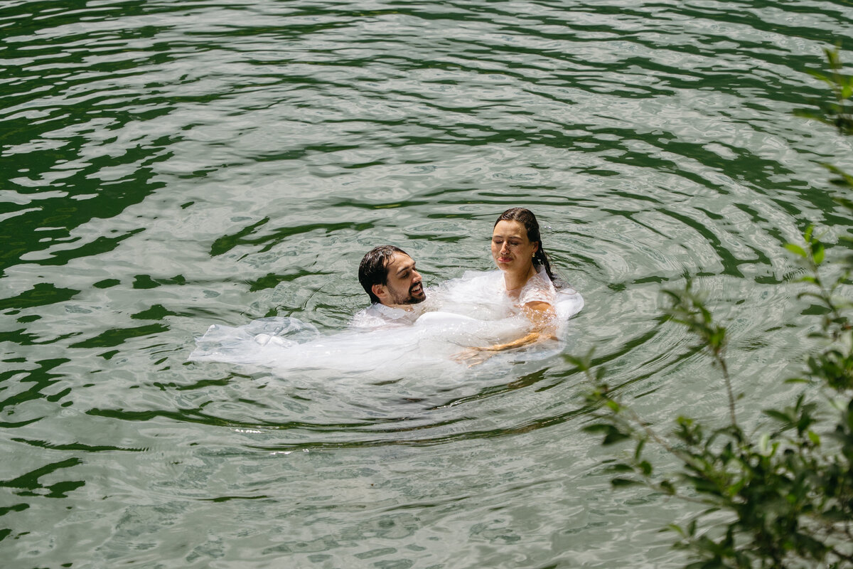 Groom helps bride recover from bad swing on rope in Seealpsee