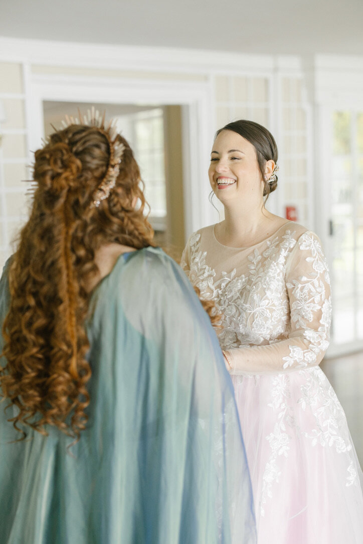 Red curly haired bride with fishtails and crystal crown