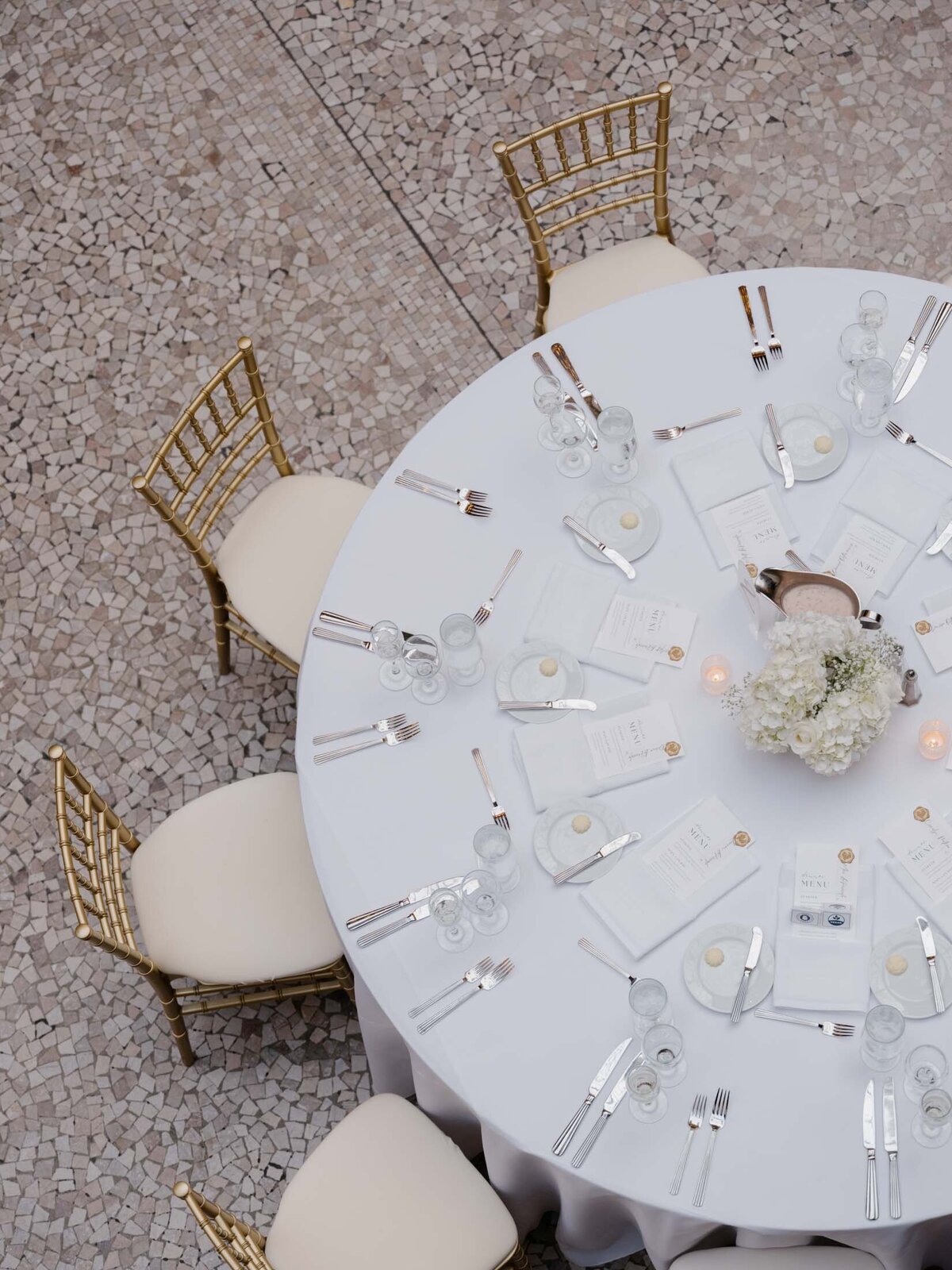 Chic reception table with acrylic accents at The Arcade wedding