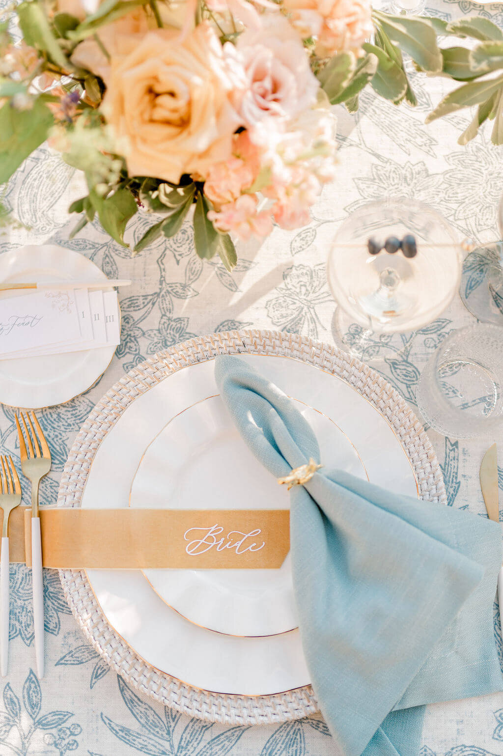 Wedding photo of blue and white tablescape