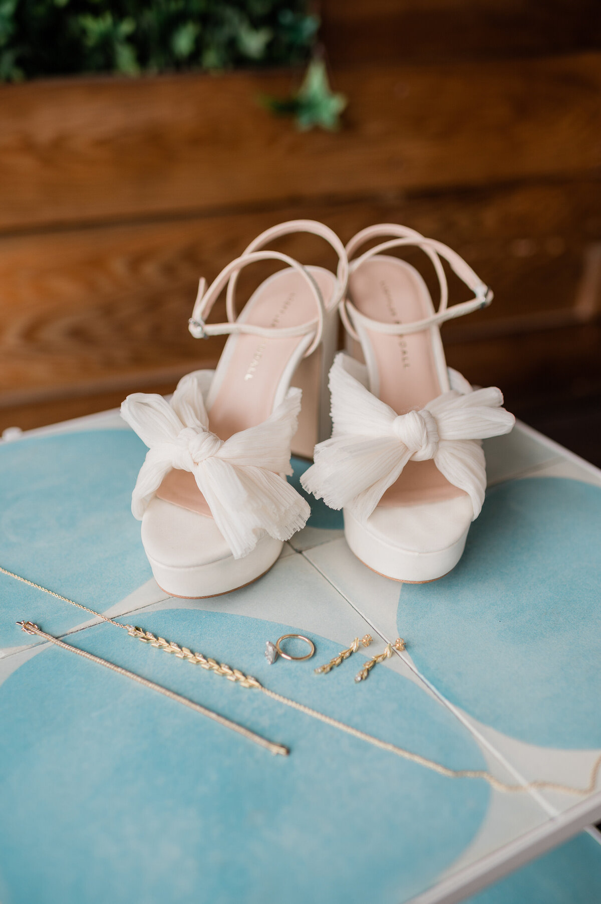 White wedding heels and jewelry 