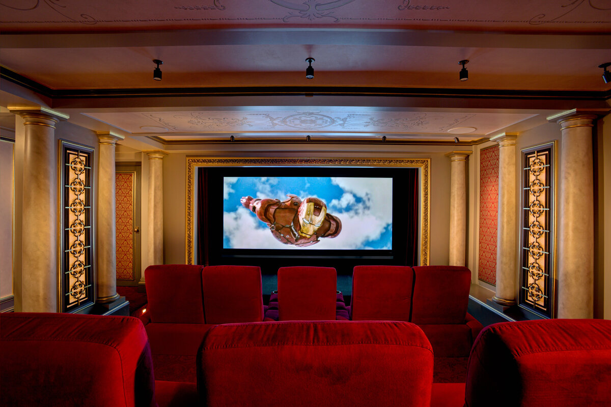 theatre room with bright red floor and chairs