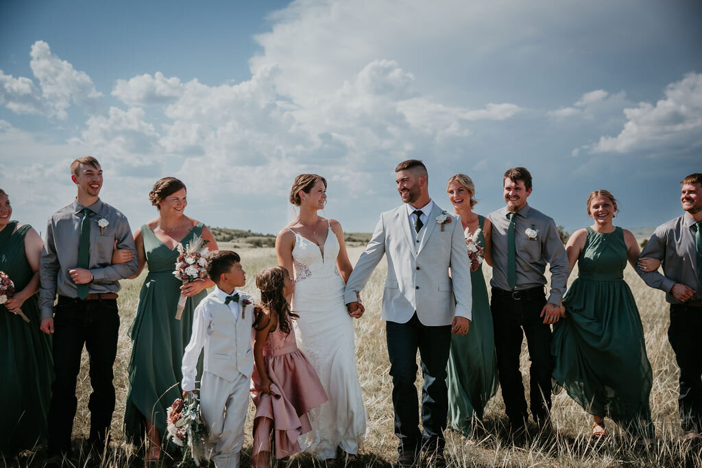 Bridal party photography with storm in background