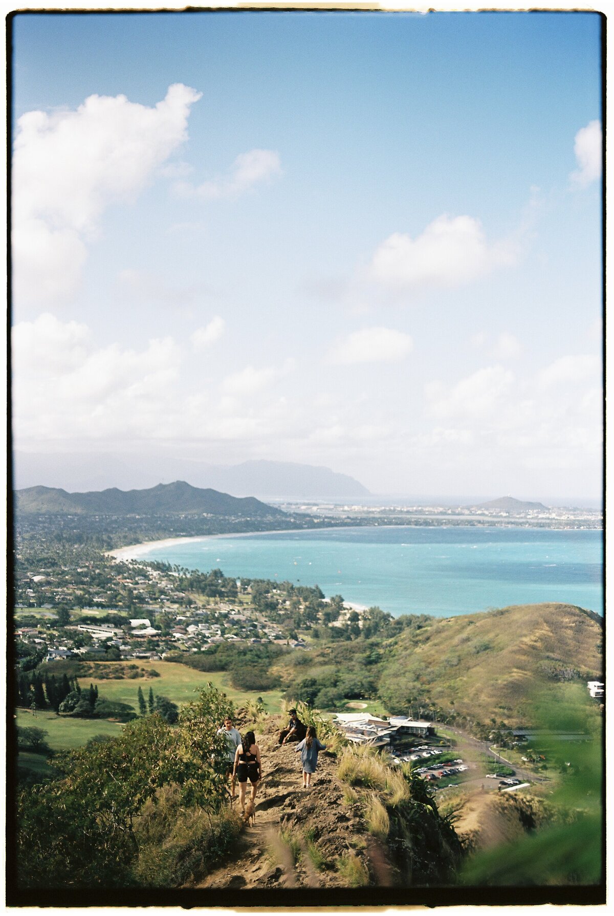 Kailua view from the bluffs captured on film by Kate Winters Photography, showcasing the natural beauty and scenic landscape in an authentic, documentary style.