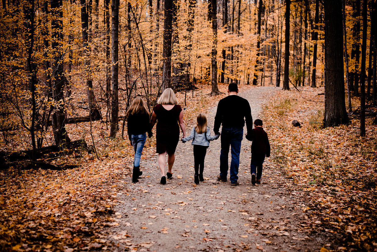 Family going for a walk for Toronto family photography session