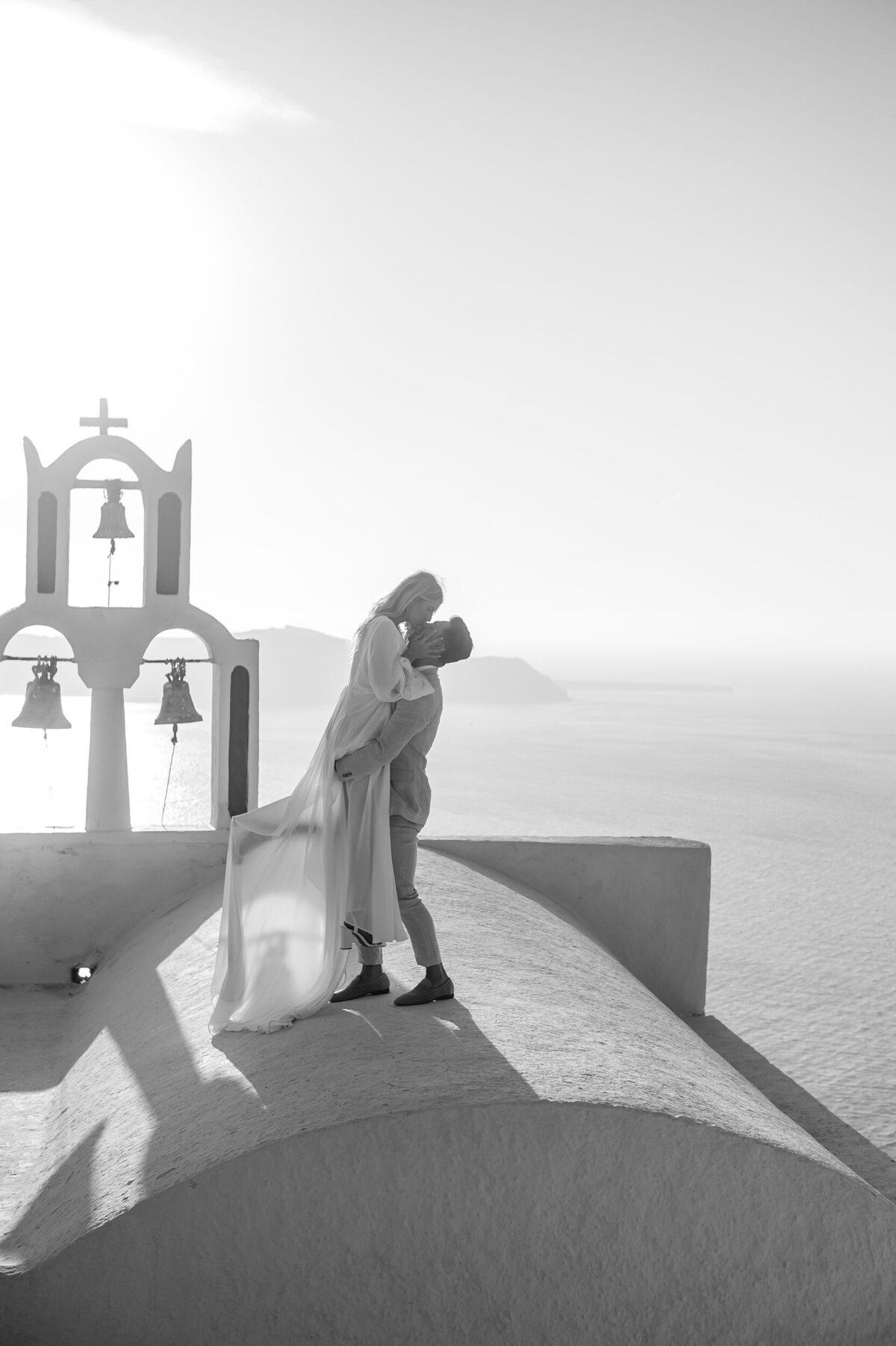 Sharky and Emilia's sliffside elopement in Skaros Rock, Greece